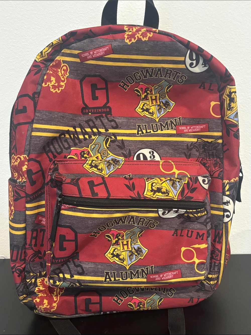 Bioworld Harry Potter Hogwarts Alumni Gryffindor Backpack Allover Print Bookbag